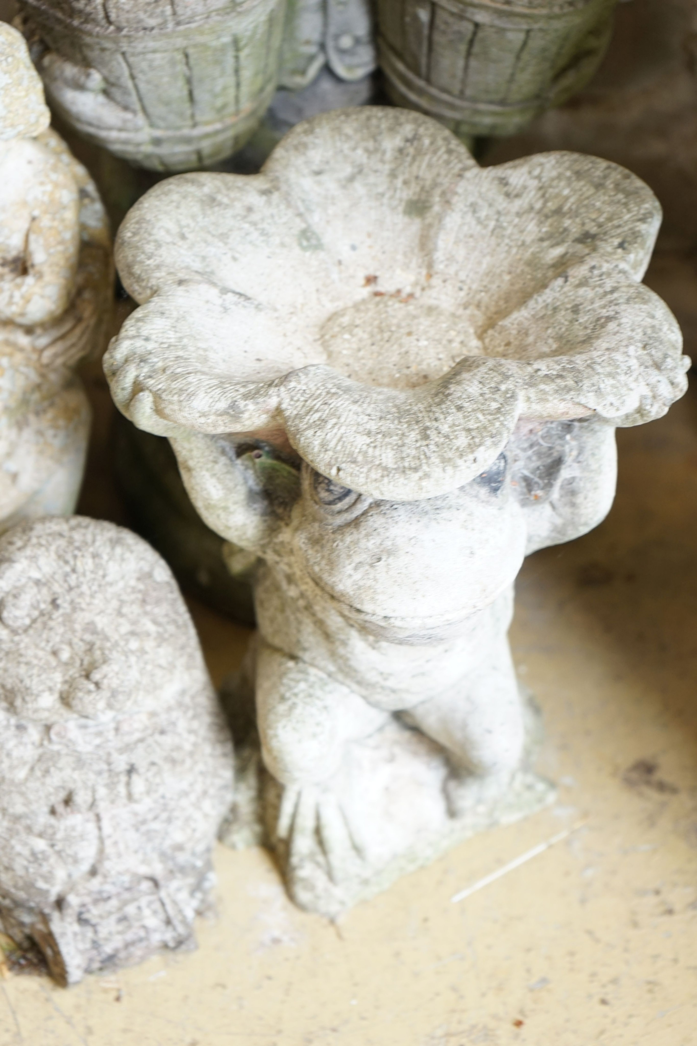 Five reconstituted stone garden ornaments, largest height 55cm